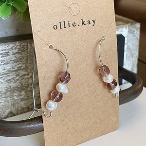 Handmade earrings with purple beads and pearls